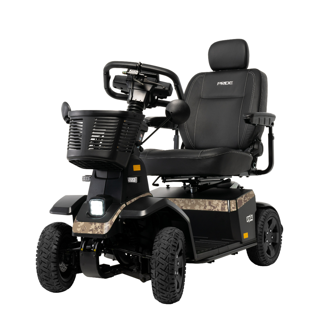 The Pride Mobility PX4 HD Bariatric Scooter features a black and tan design, rugged tires, padded seat with headrest, armrests, control panel, and front basket. Built for outdoor use and accessibility, it supports high weight capacity users.